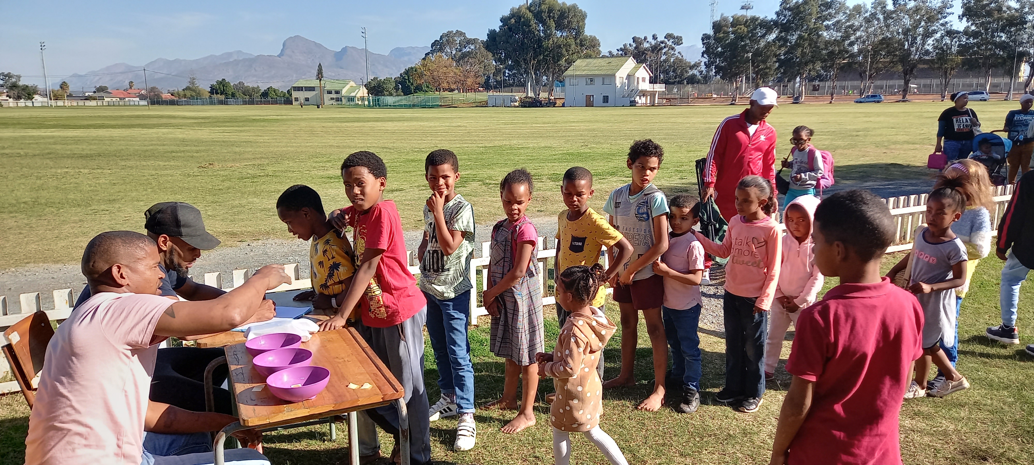 Families gathering at Boland Park Stadium